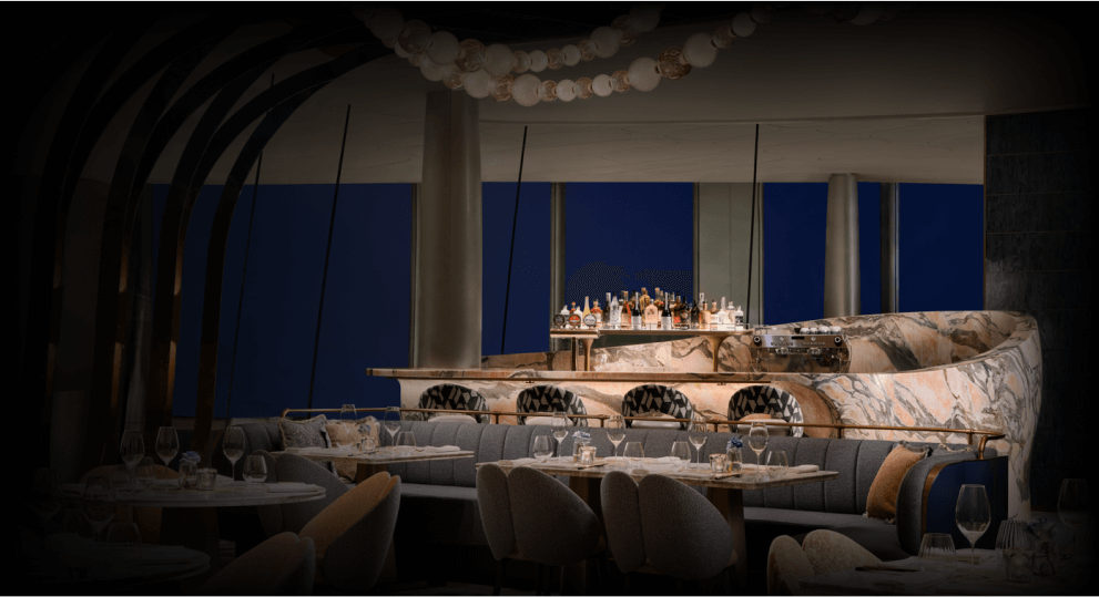 Akira Back restaurant interior with artistic water tornado installation at the entrance